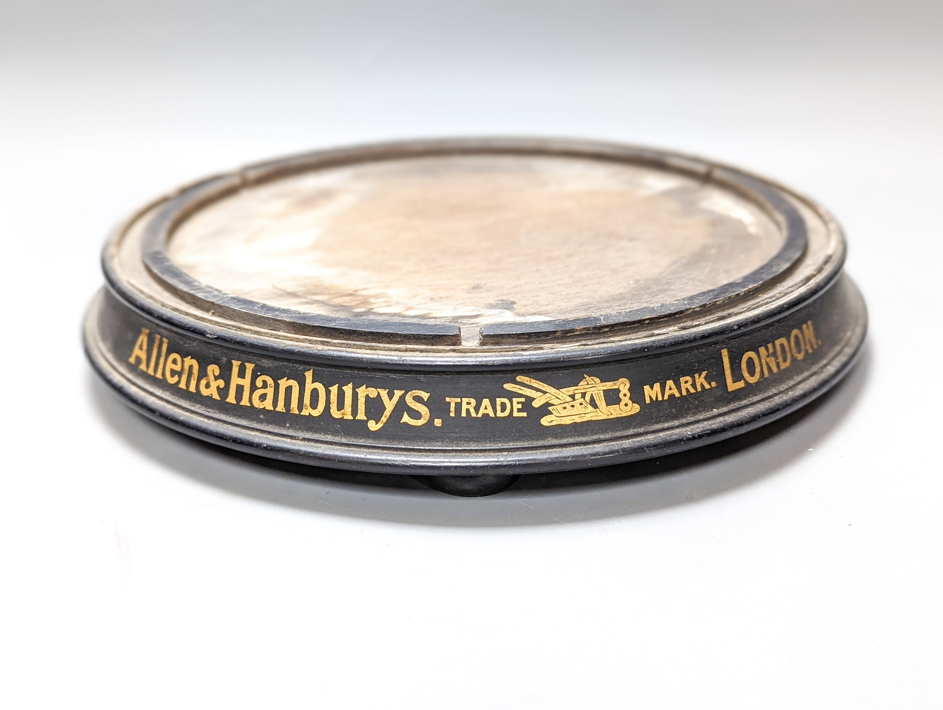 An Allen & Hamburys trade mark London display stand (base only) 30cm